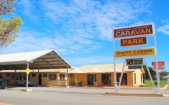 Ceduna Airport Caravan Park for On Site Camping and Accommodation. PO Box 283, Ceduna, South Australia 5690. For further information telephone or fax (08) 8625 2416. Email contact&nbsp;csfoster@bigpond.com.au&nbsp;Ceduna's Airport Caravan Park is located next to Ceduna's Airport - 780 kilometres west of Adelaide, and 2000 kilometres to the east of Perth. Situated on the Eyre Highway's eastern approaches to Ceduna, the Airport Caravan Park facility is one of the quietest and most secure in Ceduna. With plenty of space and a swimming pool, it's also becoming very popular with families and small groups crossing the Nullarbor.
